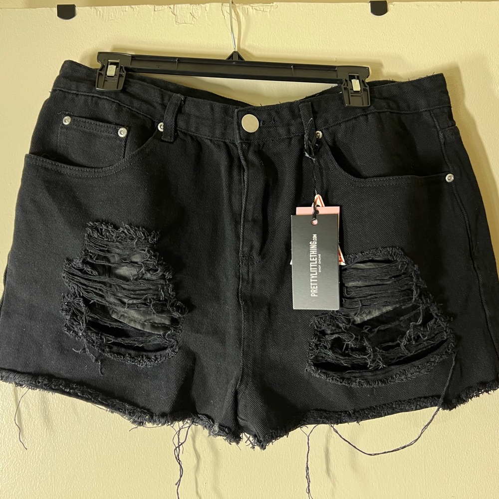 Distressed black denim shorts